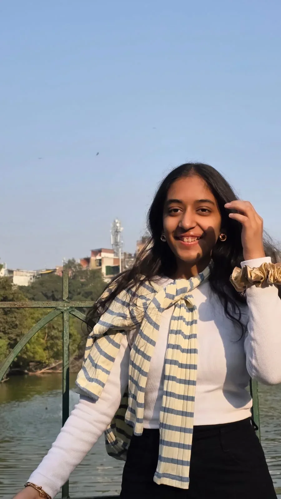 A sunny portrait beside the water