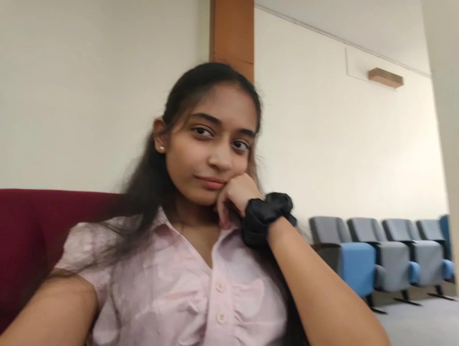 Waiting in a college auditorium